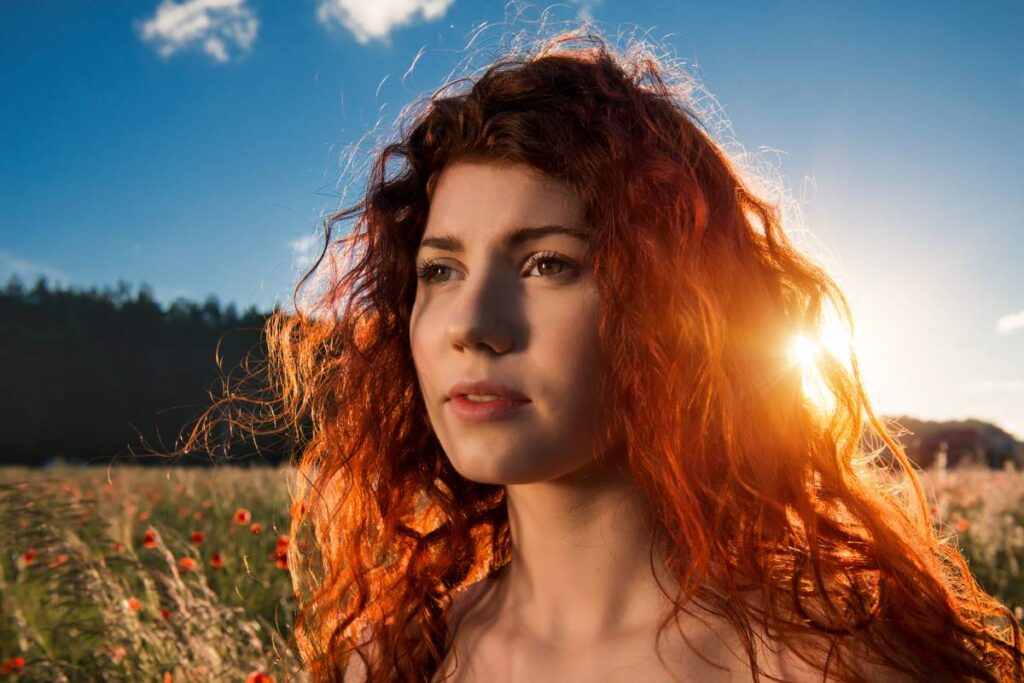 Woman feel freedom and harmony in the nature